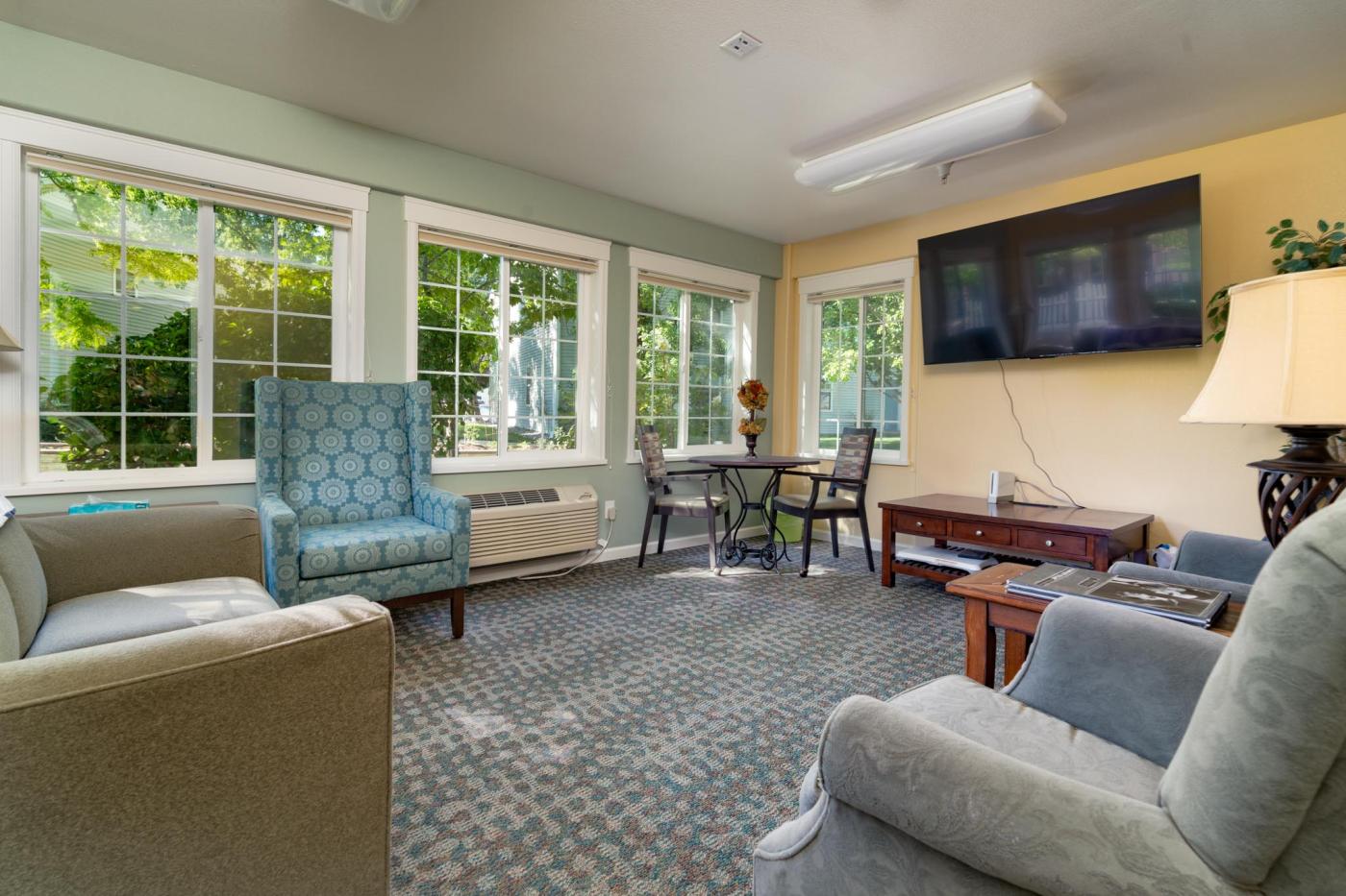 Sun room with furniture and TV for playing video games